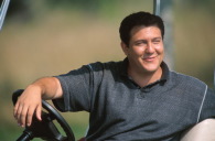 man in golf cart